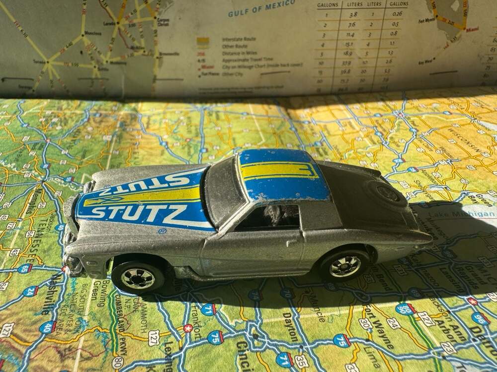VTG 1979 Hot Wheels Stutz Blackhawk Diecast Car Silver w/ Blue & Yellow Tampos